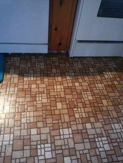 This old house: I've actually seen these floors on the "before" part of an HGTV makeover show!