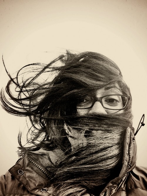 To capture the wind I had to take about ten shots. The iPhone had trouble focusing with the hair moving. I love this shot. It was COLD and WINDY and you can TELL.