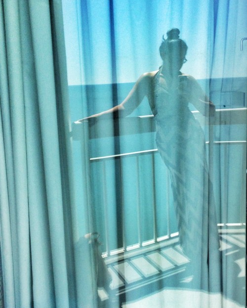 On a recent vacation I saw my reflection in the the porch door and thought my makeshift beachwear of suit under maxi skirt looked awesome.